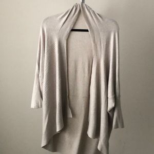 Beige cape like sweater